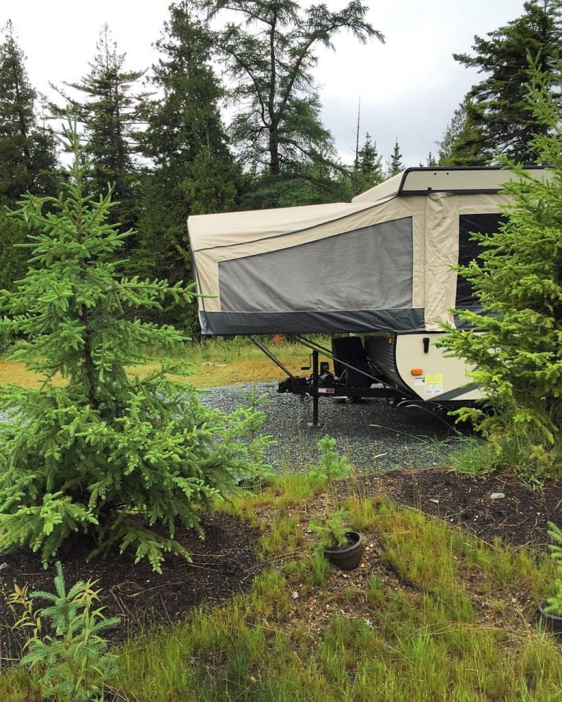 pop up camper in woods