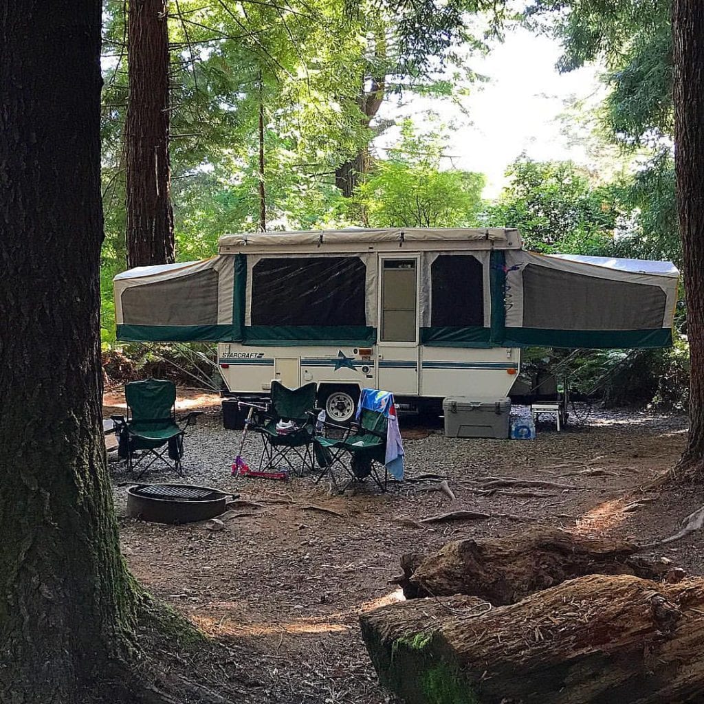 pop up camper in woods