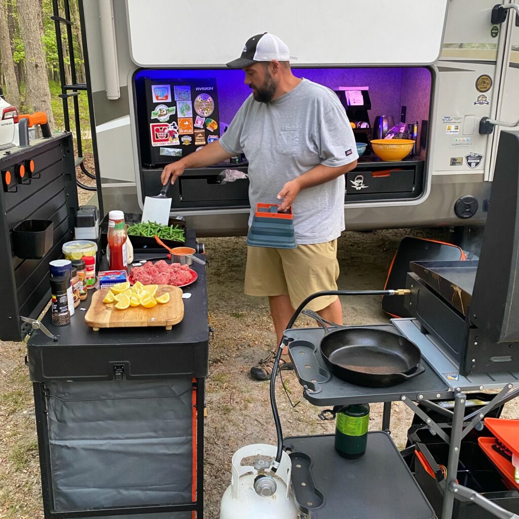 Jeremy cooking at the campground