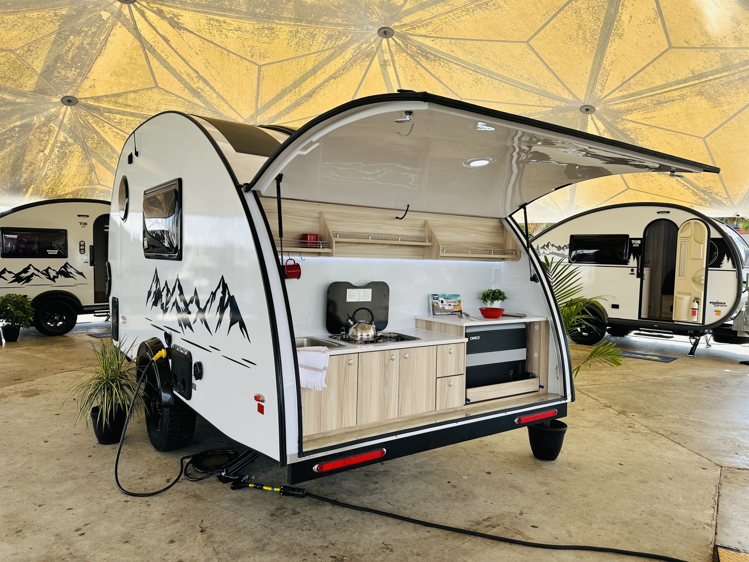 Exterior clam shell kitchen on a nuCamp travel trailer